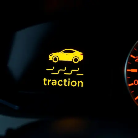Traction control warning light – car with squiggly lines symbol explained by mechanic.